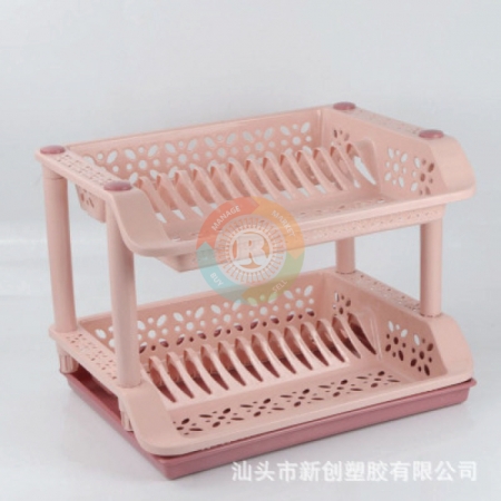 Pink plastic dish rack