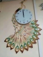 Decorative tausi decorated wall clock