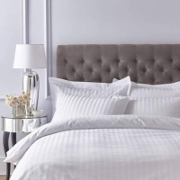Plain white cotton duvet with satin line Hotel make duvets Bound edges One bedsheet Two pillowcases size 6x6