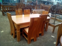 Quality solid hardwood Dining table with 6 artistic chairs and  a modern finish