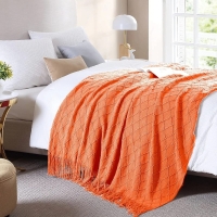 Orange High quality Knitted throw blankets with tassel, keep warm in cold times.