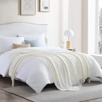 Cream High quality Knitted throw blankets with tassel, keep warm in cold times.